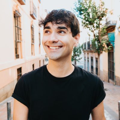 handsome-man-outdoors-portrait-man-smiling-looking-in-the-camera.jpg